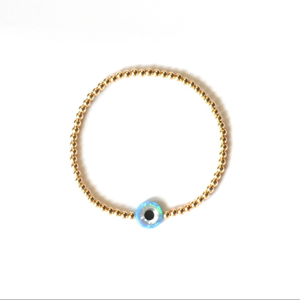 Blue opal evil eye gold bracelet
